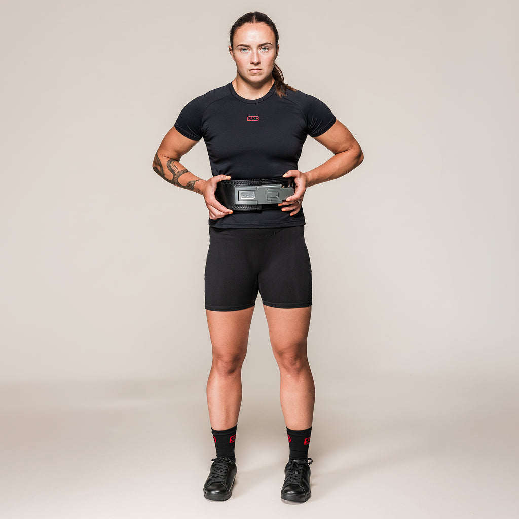 SBD 13mm Lever Belt in black, full-length front view on an athlete