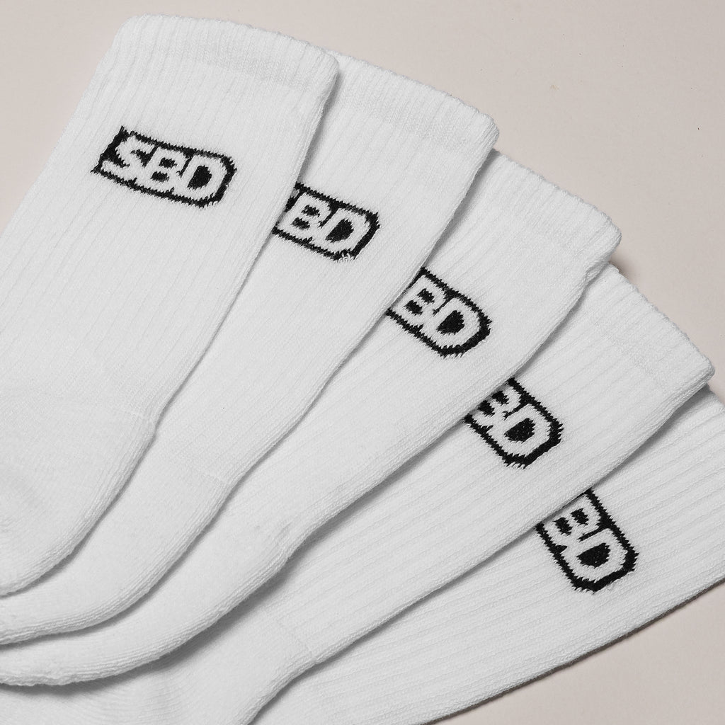 White SBD Crew Socks five-pack, close-up of the ribbed cuffs and logos