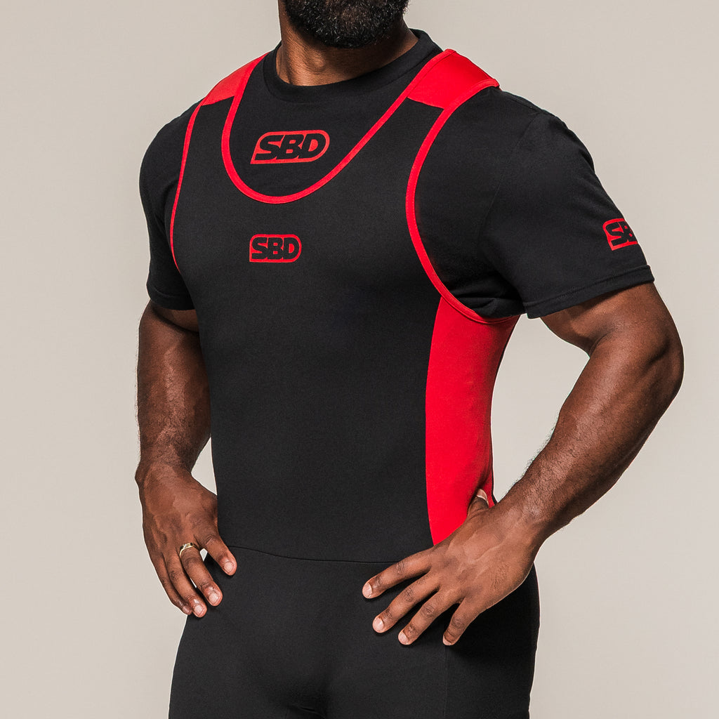 Men's SBD Full Length Singlet, front three-quarter view showing the red side panel