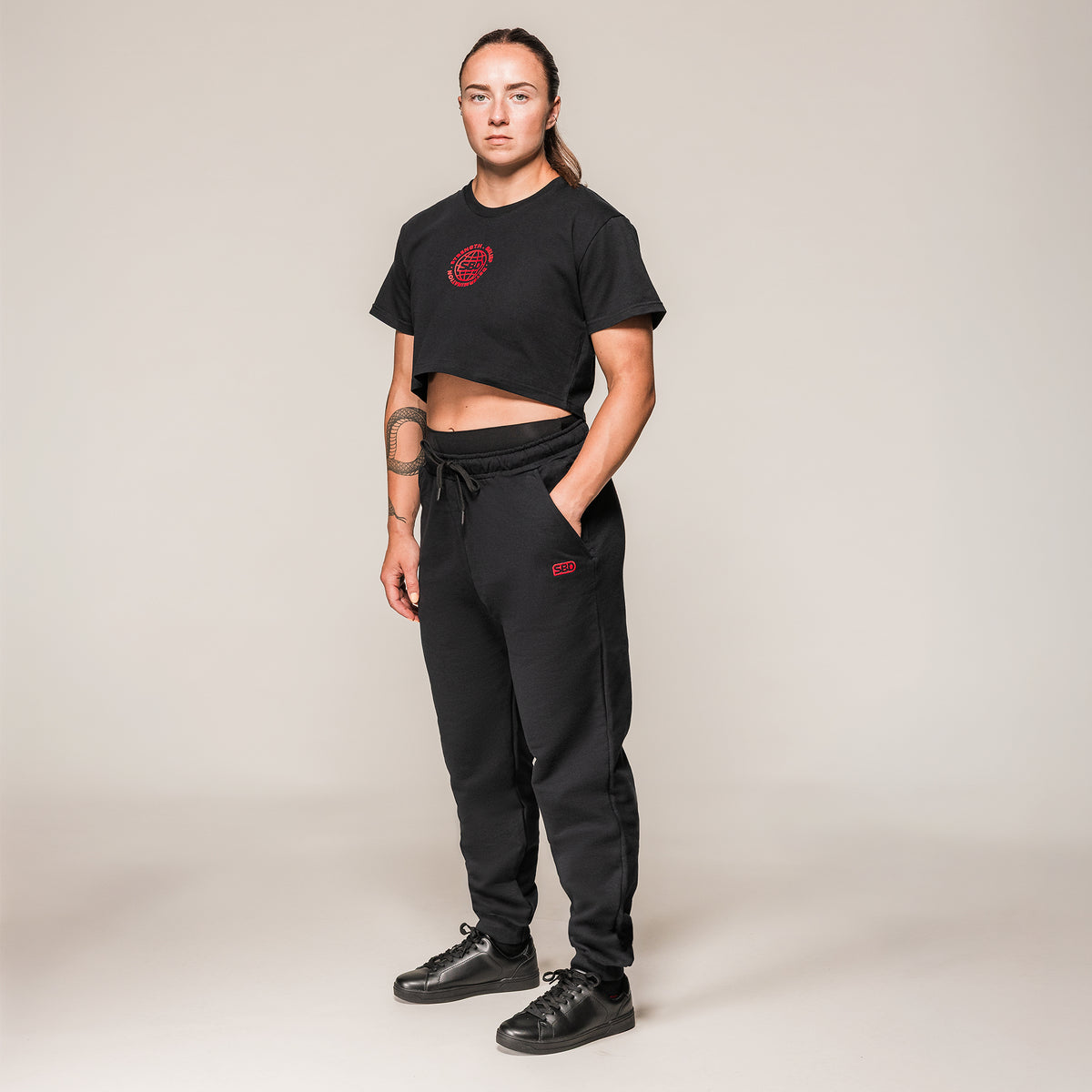 Black SBD Joggers, full-length view worn with a crop top