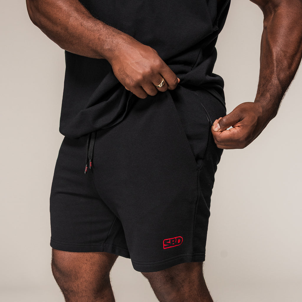Men's black SBD Shorts showing the zipped side pocket