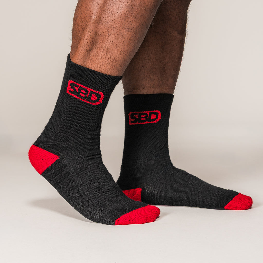 Black and red SBD Sports Socks, side view