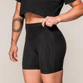 Women's black SBD Training Shorts, front view showing the high waistband