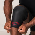 SBD Weightlifting Knee Sleeve, close-up of the red logo and lower edge